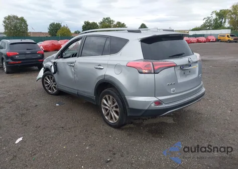2018 Toyota Rav4 Limited from USA, damaged, VIN 2T3DFREV2JW842182